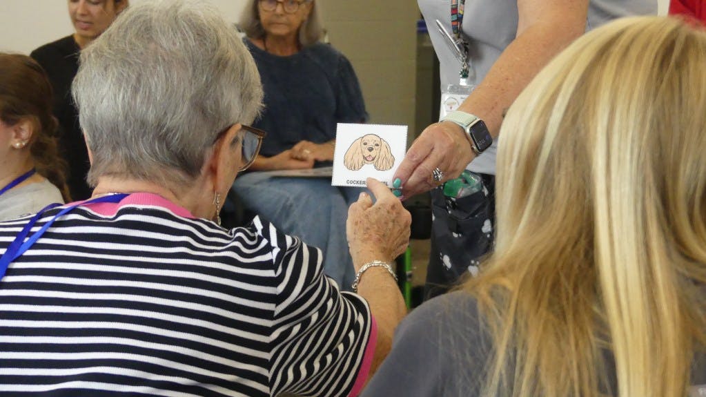 Participants of the UGA aphasia camp play man's best friend bingo.