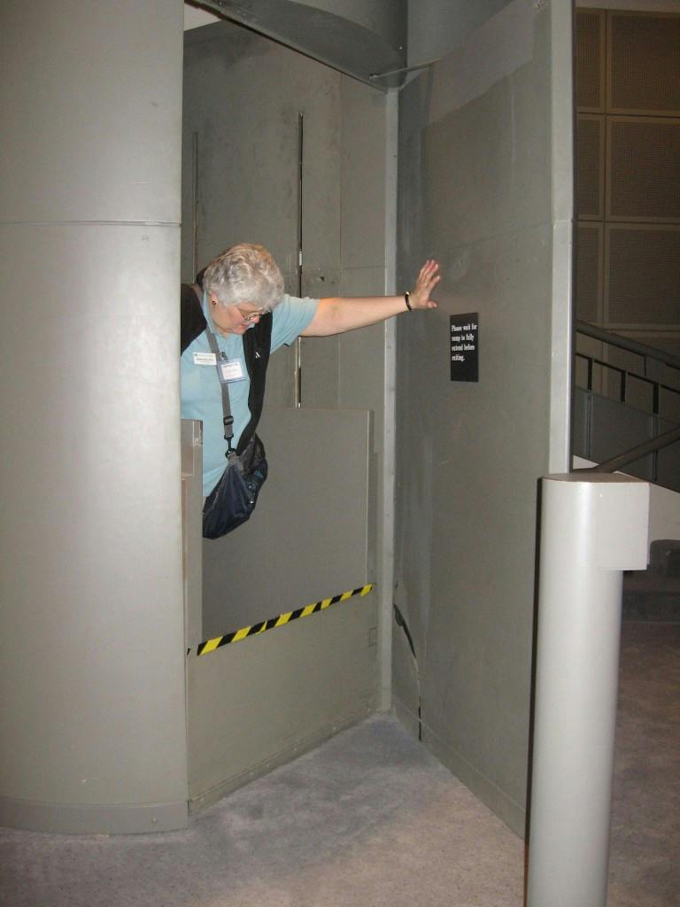 Sherril York evaluates a wheelchair lift at the U.S. Holocaust Memorial Museum in Washington, D.C.