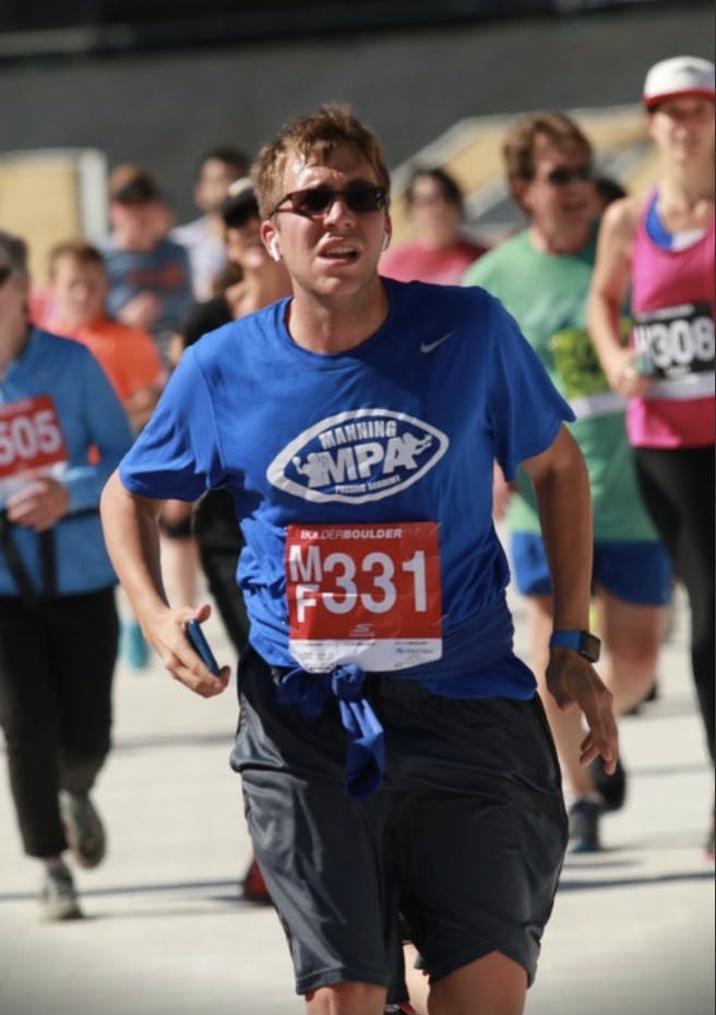 Benjamin Boudreaux running the BoulderBolder10k